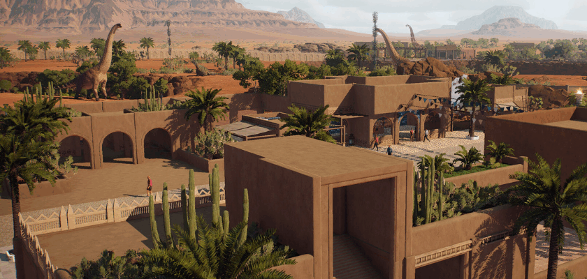 Wüstenlandschaft mit einem aufgebauten prähistorischen Zoo, Gehegen und Dinosauriern im Hintergrund in Prehistoric Kingdom