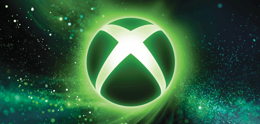 Leuchtendes Xbox-Logo in grün vor dunklem Hintergrund mit abstrakten Lichtpartikeln und dynamischen Energieeffekten.