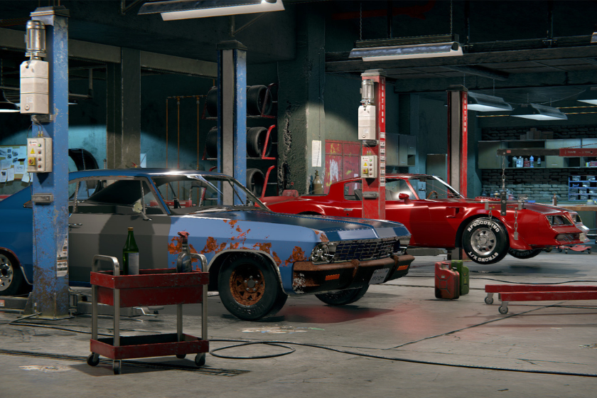 Screenshot aus Car Mechanic Simulator 2018 mit einem blauen, rostigen Muscle Car und einem roten Sportwagen auf Hebebühnen in einer Auto-Werkstatt.