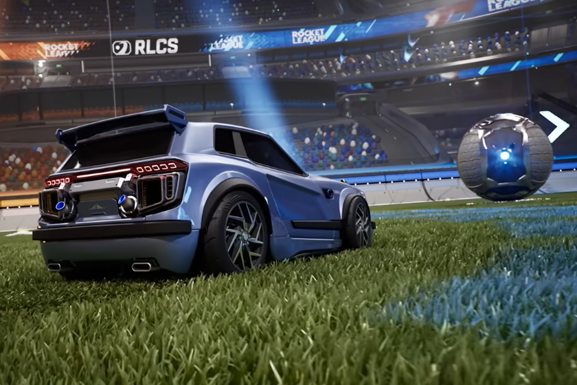Rocket League Stadion mit futuristischem Fahrzeug und Ball auf detailreichem Rasen in der Unreal Engine 6 Grafikdemo.