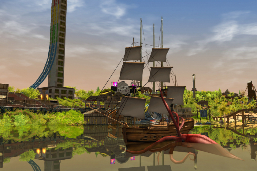 Screenshot aus RollerCoaster Tycoon 3 Complete Edition mit einem Freizeitpark am Wasser. Im Vordergrund umschlingt ein riesiger Kraken ein Piratenschiff, während im Hintergrund eine hohe Achterbahn und weitere Attraktionen zu sehen sind.