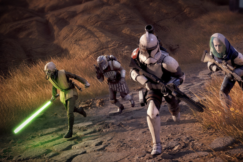 Star Wars Zero Company zeigt einen Elite-Trupp aus Klonsoldaten, einem Jedi und weiteren Kämpfern, die während der Klonkriege über felsiges Gelände in den Kampf stürmen.