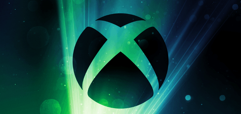 Xbox-Logo vor grün-blau leuchtendem Hintergrund mit Lichtstrahlen.