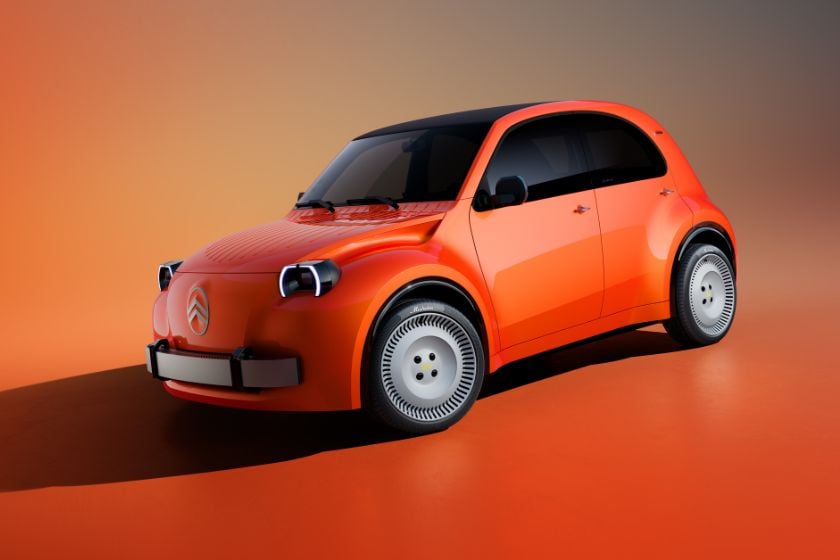 Orangefarbener Citroën 2CV Concept mit runden Frontscheinwerfern, weißen Felgen und schwarzem Faltdach vor orangefarbenem Hintergrund.