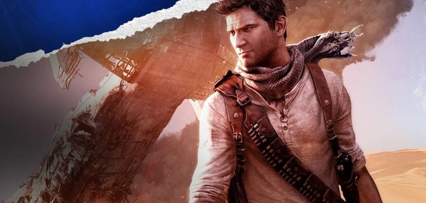 Nathan Drake aus Uncharted 3 steht mit Schulterholster und Schal vor einem abgestürzten Flugzeug in der Wüste.